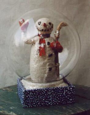 snowglobe snowman 10 inches  (note: there are two images and  the head comes off)